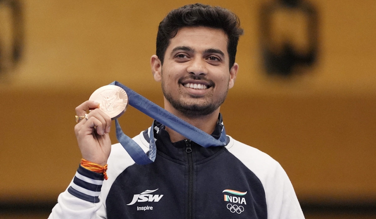 Bronze medallist Swapnil Kusale of India poses with his medal